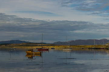 Fototapeta na wymiar Landscape view of boats in the bay in Ushuaia, Tierra del Fuego , Argentina