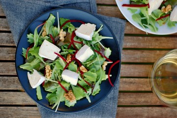 Fresh salad with lettuce, beetroot, walnut and camembert cheese