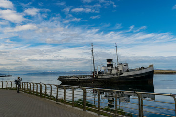 Landscape view of Saint Christopher ship on the Beagle Channel bay in Ushuaia, Tierra del Fuego, Argentina