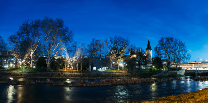 The Platzspitz park in Zurich city center at dusk.