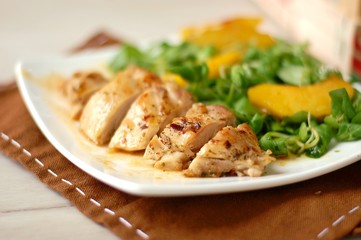 Chicken fillets white lettuce, peach and sweet and sour sauce