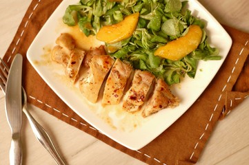 Chicken fillets white lettuce, peach and sweet and sour sauce