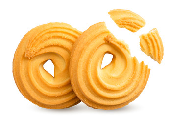 Round shortbread cookies and broken pieces in close-up