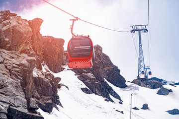 Red Cable car roprway way to mountains view scenic skyline landscape snow mountain view of Dagu...