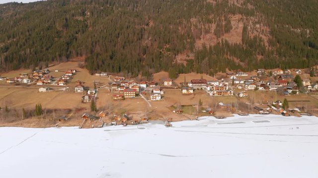 Aerial shot of Weissensee and its lake in Carinthia, Austria