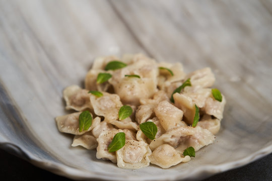 Traditional Azerbaijani cuisine, soup with small dumplings with a lot of spices