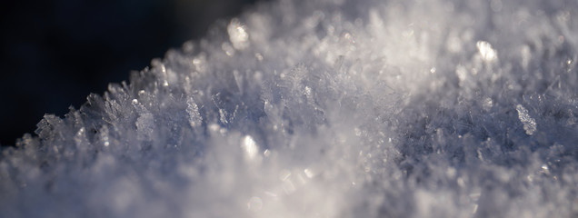 close-up of frozen snow with visible crystals                              
