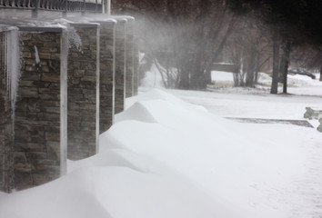 city streets covered with snow during a winter snowstorm