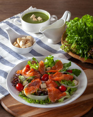 Fresh vegetable salad with smoked salmon