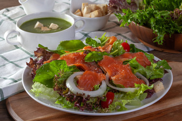 Fresh vegetable salad with smoked salmon