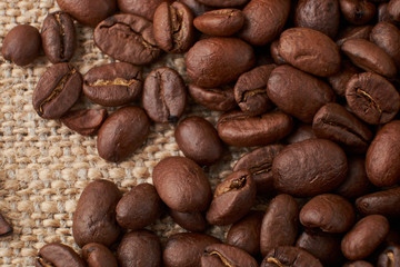 Coffee Cup and coffee beans on the table close-up