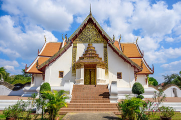Fototapeta na wymiar Wat Phumin Temple with blue sky background, Nan Province, Thailand