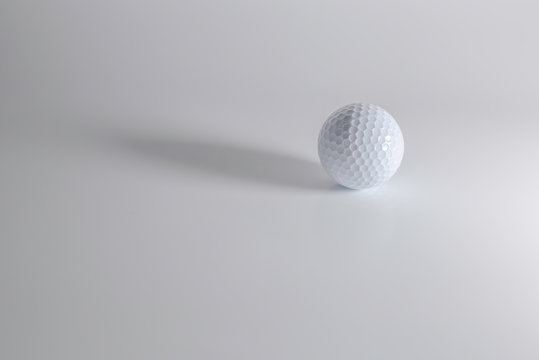 golf ball on white background film style