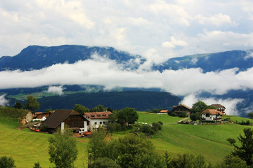 Fototapeta na wymiar Village in the Dolomites Valley