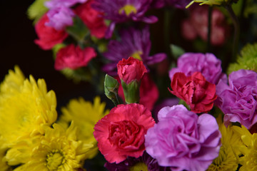 Various Colorful Flowers Bunched Together - Pink, Yellow, Purple Carnations & Mums