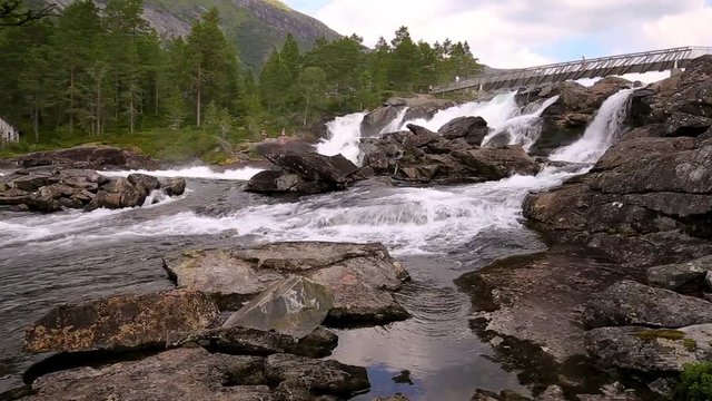 Majestic cascade Likholefossen along National Scenic route Gaularfjellet in Norway