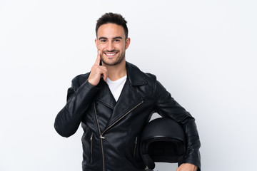 Fototapeta premium Man with a motorcycle helmet smiling with a happy and pleasant expression