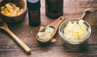 Chios mastic tears on wooden background, closeup view