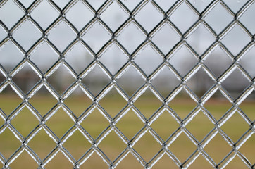 Fototapeta premium icy chain link fence