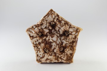 Slice of a dried Mehogni fruit