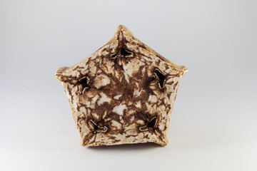 Slice of a dried Mehogni fruit