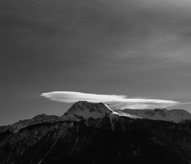 mountain during winter with clouds