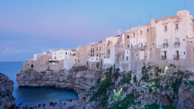 Cliff top houses at dusk Italy