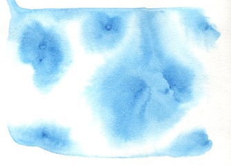 Abstract blue watercolor on white background. The color  is blurry in the paper. It is a hand drawn design illustration.