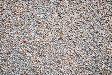 Pebbles On The Wall Of A House.