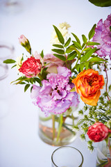 Obraz na płótnie Canvas Flowers in vase on table 