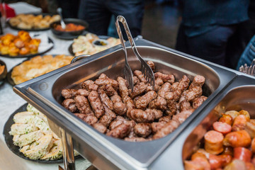 Tasty grilled mix meat, serving on event dish at party