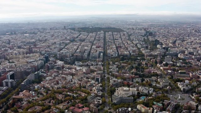 Madrid city aerial view of urban neighborhood in Spain. High angle view skyline feat. suburbs houses and downtown of Spanish capital in Europe