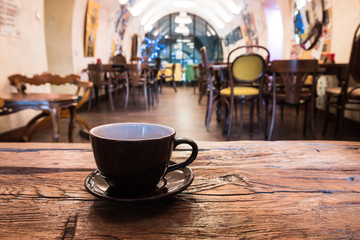 closeup of a cup of coffee at coffee shop