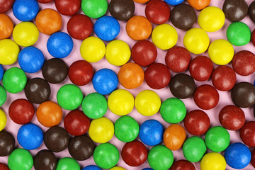 Fototapeta na wymiar Colorful candy sprinkles background, texture.