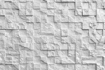 The texture of the stone. White brick. Decorative wall in the interior of the apartment.