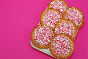 Rusk with pink and white anise seeds.  Traditional Dutch treat to celebrate the birth of baby girl.
