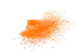 Abstract orange powder explosion. Closeup of orange dust particle splash isolated on white...
