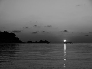 Alien sunset over the sea (black and white)