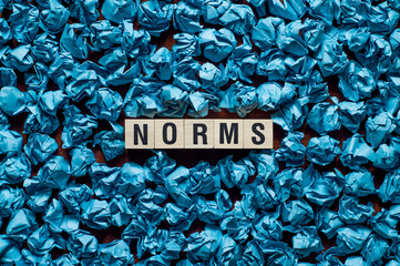 Norms word concept on cubes