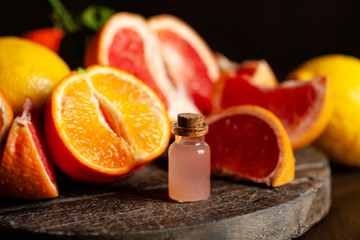 Concept of natural fruity organic ingredients in cosmetology. Extract of grapefruit for...