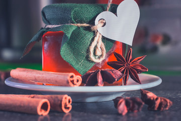 Glass jar with honey for Valentine's Day.