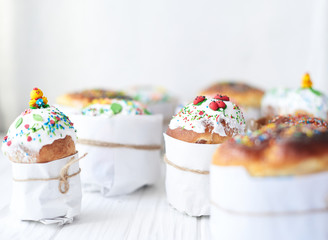 Easter cakes on a white wooden background