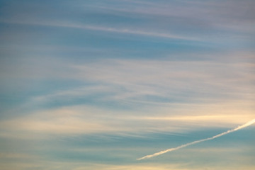 white Cumulus clouds in a blue sky