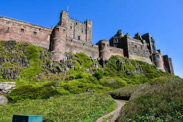 view of Bramburgh Castle on a hill in England