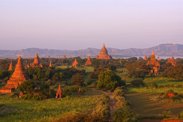 Naklejka premium Beautiful colorful view of Bagan valley with temples during sunrise, Burma Myanmar