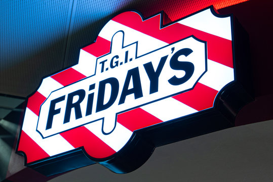 BERLIN - DEC 27: TGI Fridays Logo or TGI Fridays Exterior in Berlin on December 27. 2019 in Germany. 