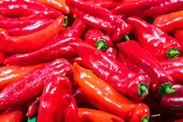 red peppers. Raw vegetables and fruits background. Healthy organic food concept. A group of fresh and clean red peppers