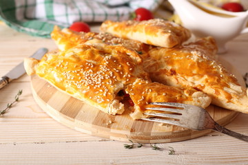Vegetarian Cheese and Tomato Puffs on white background