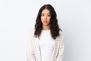 Obraz premium Mixed race woman over isolated white background with sad and depressed expression