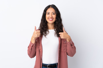 Spanish Chinese woman over isolated white background giving a thumbs up gesture